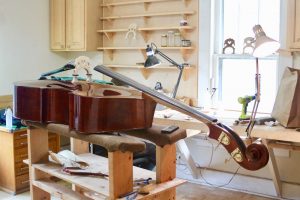 Dustin Williams repairs and makes violins, violas, basses, and cellos