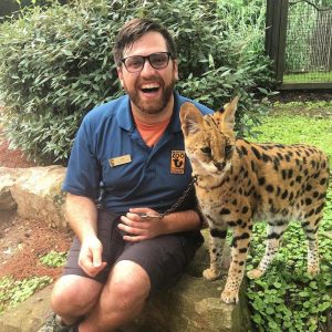 clouded leopard and animal keeper at Nashville zoo