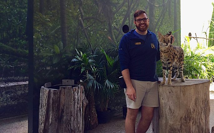 animal keeper and clouded leopard at Nashville zoo